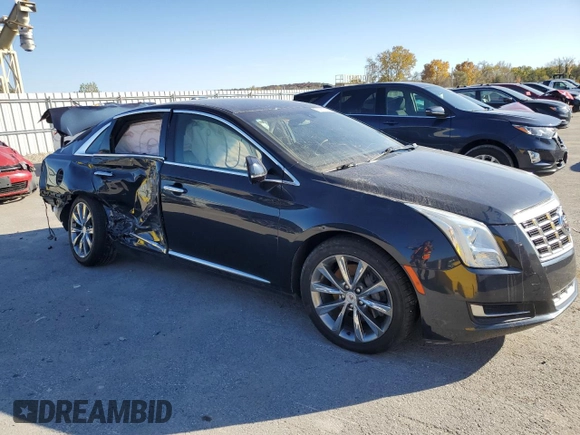 2014 Cadillac XTS z VIN 2G61L5S39E9300636, wystawiony jako Copart lot #78068634 z przebiegiem 117 549 mil mil oraz Szkody całkowita. Historia ofert i sprzedaży dostępna na DreamBid. Obrazek 4.