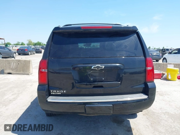 2015 Chevrolet Tahoe LTZ with VIN 1GNSCCKC4FR309152, listed as a IAAI auction lot 42029341 with 187,313 mi miles and . Bid and sale history available at DreamBid. Image 16.