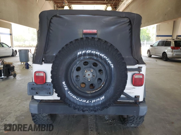 2004 Jeep Wrangler X z VIN 1J4FA39S14P724963, wystawiony jako Copart lot #59345075 z przebiegiem 70 185 mil mil oraz Czysty tytuł • Clean title. Historia ofert i sprzedaży dostępna na DreamBid. Obrazek 6.
