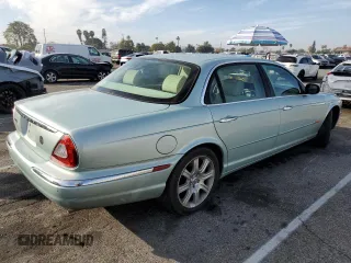 2005 Jaguar XJ with VIN SAJWA79C15SG47018, listed as a Copart auction lot 43087185 with 31,725 mi miles and Salvage Title. Bid and sale history available at carsss.com. Image 3.