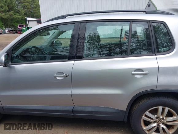 2016 Volkswagen Tiguan S with VIN WVGBV7AX1GW523335, listed as a IAAI auction lot 42091690 with 165,495 mi miles and . Bid and sale history available at DreamBid. Image 14.