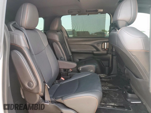 2021 Toyota Sienna XSE with VIN 5TDDRKECXMS011869, listed as a Copart auction lot 60333135 with 77,316 mi miles and Salvage title. Bid and sale history available at DreamBid. Image 11.