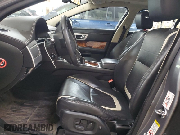 2015 Jaguar XF Portfolio with VIN SAJWJ0FF8F8U65883, listed as a Copart auction lot 55783945 with 133,431 mi miles and Salvage Title. Bid and sale history available at DreamBid. Image 7.