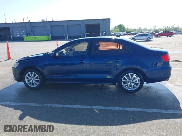 2011 Volkswagen Jetta SE with VIN 3VWDZ7AJ5BM319334, listed as a IAAI auction lot 42275321 with 111,989 mi miles and . Bid and sale history available at DreamBid. Image 14.