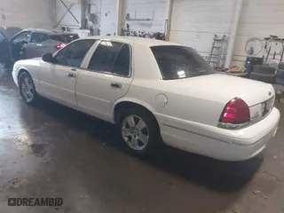 2004 Ford Crown Victoria LX with VIN 2FAFP74W14X110484, listed as a IAAI auction lot 41736140 with 220,067 mi miles. Bid and sale history available at carsss.com. Image 3.