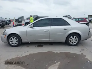 2007 Cadillac CTS z VIN 1G6DM57T870194888, wystawiony jako IAAI lot #42137827 z przebiegiem 141 082 mil mil oraz . Historia ofert i sprzedaży dostępna na DreamBid. Obrazek 14.