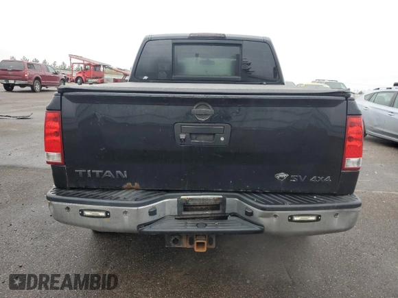 2014 Nissan Titan Pro-4X with VIN 1N6AA0EC3EN514744, listed as a Copart auction lot 80469314 with 191,780 mi miles and Salvage title. Bid and sale history available at DreamBid. Image 6.