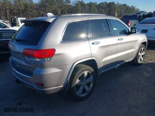 2014 Jeep Grand Cherokee Overland with VIN 1C4RJFCGXEC162238, listed as a IAAI auction lot 41291512 with 88,261 mi miles. Bid and sale history available at carsss.com. Image 4.