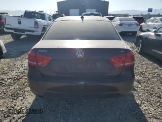 2013 Volkswagen Passat SE z VIN 1VWBH7A39DC048715, wystawiony jako Copart lot #58074325 z przebiegiem 199 807 mil mil oraz Czysty tytuł • Clean title. Historia ofert i sprzedaży dostępna na DreamBid. Obrazek 6.