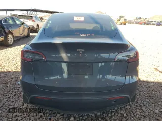 2022 Tesla Model Y Long Range z VIN 7SAYGDEE3NF543705, wystawiony jako Copart lot #50244955 z przebiegiem 59 063 mil mil oraz Szkody całkowita. Historia ofert i sprzedaży dostępna na DreamBid. Obrazek 6.