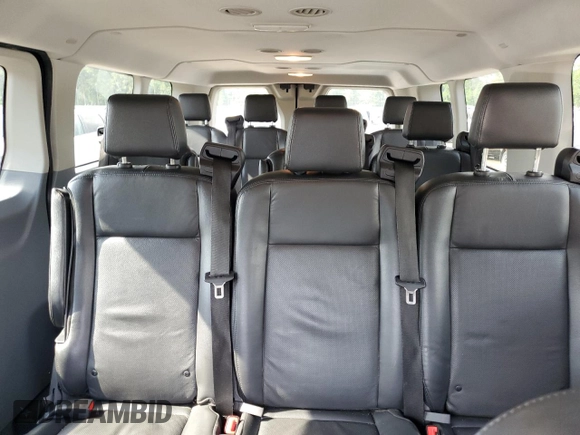 2018 Ford Transit Passenger XL z VIN 1FBZX2YG2JKB39878, wystawiony jako Copart lot #54557905 z przebiegiem 132 974 mil mil oraz Szkoda całkowita • Salvage title. Historia ofert i sprzedaży dostępna na DreamBid. Obrazek 10.