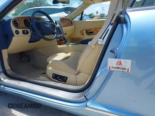 2007 Bentley Continental GT z VIN SCBDR33W17C044528, wystawiony jako IAAI lot #42308345 z przebiegiem Nie podano mil oraz . Historia ofert i sprzedaży dostępna na DreamBid. Obrazek 6.
