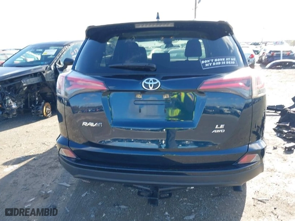 2018 Toyota RAV4 LE with VIN JTMBFREV1JJ743018, listed as a IAAI auction lot 41974309 with 59,135 mi miles. Bid and sale history available at carsss.com. Image 17.