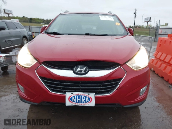 2013 Hyundai Tucson GLS with VIN KM8JU3AC8DU683546, listed as a IAAI auction lot 41956167 with 141,510 mi miles. Bid and sale history available at carsss.com. Image 12.