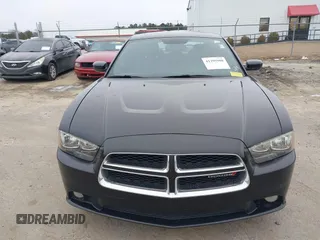 2013 Dodge Charger SXT with VIN 2C3CDXHG2DH525370, listed as a IAAI auction lot 41395980 with 226,079 mi miles. Bid and sale history available at carsss.com. Image 6.