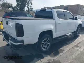 2021 Chevrolet Colorado 2WD Work Truck z VIN 1GCGSBENXM1118310, wystawiony jako IAAI lot #41668804 z przebiegiem 65 295 mil mil oraz . Historia ofert i sprzedaży dostępna na DreamBid. Obrazek 4.