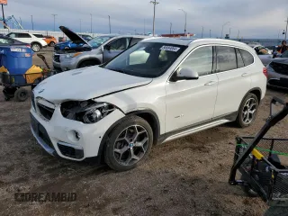 2017 BMW X1 xDrive28i with VIN WBXHT3Z36H4A65762, listed as a Copart auction lot 80884864 with 182,732 mi miles and Clean Title. Bid and sale history available at carsss.com. Image 1.