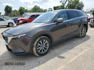 2018 Mazda CX-9 Touring z VIN JM3TCACY7J0206579, wystawiony jako Copart lot #67508994 z przebiegiem 97 309 mil mil oraz Szkoda całkowita • Salvage title. Historia ofert i sprzedaży dostępna na DreamBid. Obrazek 1.