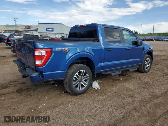 2023 Ford F-150 XL with VIN 1FTEW1EP8PKE04419, listed as a Copart auction lot 60843835 with 31,684 mi miles and Salvage title. Bid and sale history available at DreamBid. Image 3.