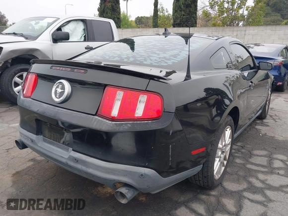 2012 Ford Mustang Premium with VIN 1ZVBP8AM3C5234884, listed as a IAAI auction lot 41880779 with 149,758 mi miles and . Bid and sale history available at DreamBid. Image 4.