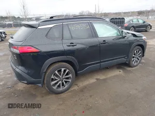 2023 Toyota Corolla Cross XLE z VIN 7MUDAABG8PV071006, wystawiony jako IAAI lot #41845752 z przebiegiem 33 398 mil mil oraz . Historia ofert i sprzedaży dostępna na DreamBid. Obrazek 4.