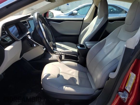 2014 Tesla Model S 60 with VIN 5YJSA1S12EFP65799, listed as a Copart auction lot 50895235 with 132,669 mi miles and Salvage Title. Bid and sale history available at DreamBid. Image 7.