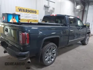 2017 GMC Sierra 1500 Denali z VIN 3GTU2PEJ1HG176844, wystawiony jako IAAI lot #42017007 z przebiegiem 185 433 mil mil oraz . Historia ofert i sprzedaży dostępna na DreamBid. Obrazek 4.