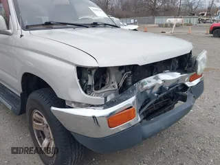 1998 Toyota 4Runner SR5 z VIN JT3GN86RXW0059946, wystawiony jako IAAI lot #41843789 z przebiegiem 293 069 mil mil oraz . Historia ofert i sprzedaży dostępna na DreamBid. Obrazek 13.