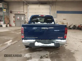 2011 GMC Canyon SLE1 with VIN 1GTH6MFE3B8123808, listed as a IAAI auction lot 41611231 with 142,877 mi miles. Bid and sale history available at carsss.com. Image 16.
