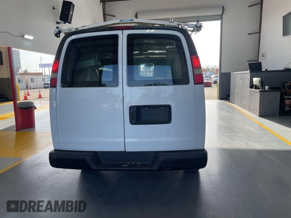 2015 Chevrolet Express Cargo with VIN 1GCWGFCF5F1172987, listed as a IAAI auction lot 42775101 with 159,466 mi miles and . Bid and sale history available at DreamBid. Image 17.