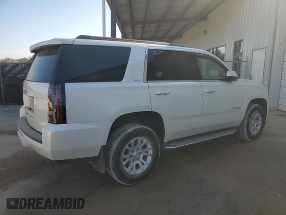 2015 GMC Yukon SLT with VIN 1GKS1BKCXFR563509, listed as a Copart auction lot 77188854 with 127,481 mi miles and Clean Title. Bid and sale history available at carsss.com. Image 3.