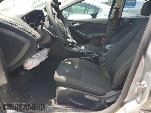 2016 Ford Focus SE z VIN 1FADP3F24GL309119, wystawiony jako Copart lot #62279095 z przebiegiem 117 535 mil mil oraz Szkoda całkowita • Salvage title. Historia ofert i sprzedaży dostępna na DreamBid. Obrazek 7.