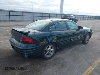 2002 Pontiac Grand Am SE1 with VIN 1G2NF52FX2C165546, listed as a IAAI auction lot 41290065 with 149,834 mi miles. Bid and sale history available at carsss.com. Image 4.