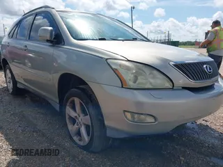 2005 Lexus RX 330 z VIN 2T2HA31U25C058252, wystawiony jako IAAI lot #42479607 z przebiegiem 249 841 mil mil oraz . Historia ofert i sprzedaży dostępna na DreamBid. Obrazek 1.