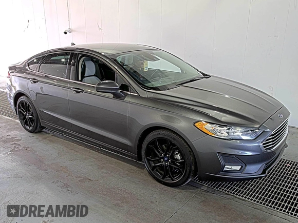 2020 Ford Fusion SE z VIN 3FA6P0HD6LR189762, wystawiony jako IAAI lot #42780149 z przebiegiem 51 099 mil mil oraz . Historia ofert i sprzedaży dostępna na DreamBid. Obrazek 9.