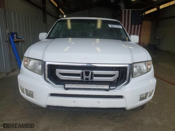 2010 Honda Ridgeline RTL with VIN 5FPYK1F57AB502049, listed as a Copart auction lot 87058684 with 228,156 mi miles and Clean Title. Bid and sale history available at carsss.com. Image 5.