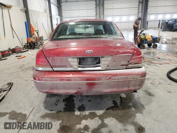 2001 Ford Crown Victoria LX z VIN 2FAFP74W21X206992, wystawiony jako Copart lot #45082985 z przebiegiem 137 954 mil mil oraz Szkoda całkowita • Salvage title. Historia ofert i sprzedaży dostępna na DreamBid. Obrazek 6.