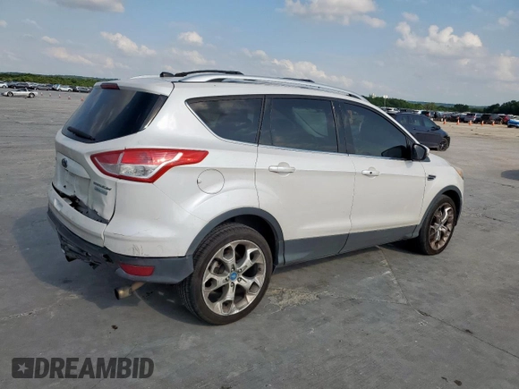 2013 Ford Escape Titanium z VIN 1FMCU0J90DUC13426, wystawiony jako Copart lot #53643565 z przebiegiem 176 600 mil mil oraz Szkoda całkowita • Salvage title. Historia ofert i sprzedaży dostępna na DreamBid. Obrazek 3.