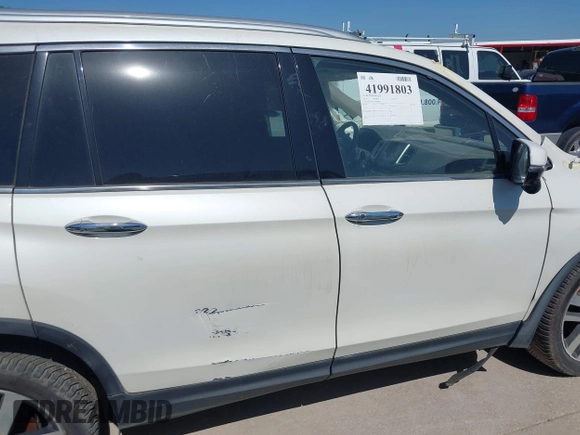2016 Honda Pilot Touring with VIN 5FNYF6H97GB088824, listed as a IAAI auction lot 41991803 with 84,761 mi miles. Bid and sale history available at carsss.com. Image 14.
