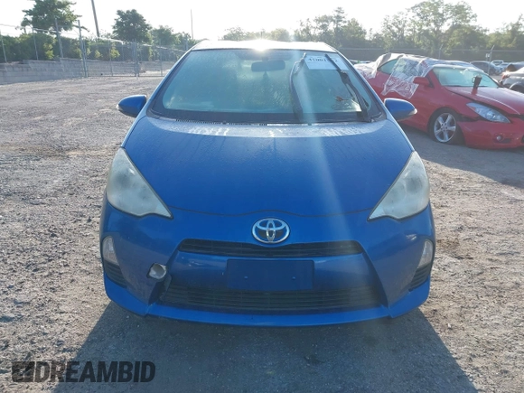 2012 Toyota Prius c One with VIN JTDKDTB34C1026833, listed as a IAAI auction lot 42001552 with 224,426 mi miles. Bid and sale history available at carsss.com. Image 12.