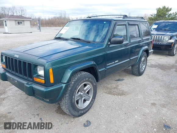 2000 Jeep Cherokee Classic with VIN 1J4FF58S3YL258755, listed as a IAAI auction lot 42020260 with 228,867 mi miles. Bid and sale history available at carsss.com. Image 2.
