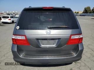 2007 Honda Odyssey EX-L z VIN 5FNRL38677B424117, wystawiony jako Copart lot #58814235 z przebiegiem 188 908 mil mil oraz Szkoda całkowita • Salvage title. Historia ofert i sprzedaży dostępna na DreamBid. Obrazek 6.
