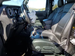 2023 Jeep Wrangler Sahara z VIN 1C4JJXP66PW605961, wystawiony jako Copart lot #50209655 z przebiegiem 32 805 mil mil oraz Szkoda całkowita • Salvage title. Historia ofert i sprzedaży dostępna na DreamBid. Obrazek 7.