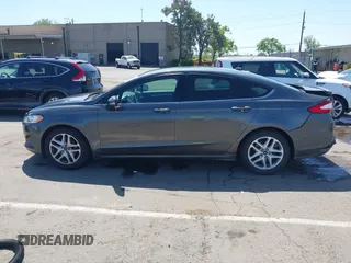 2015 Ford Fusion SE with VIN 3FA6P0H7XFR306483, listed as a IAAI auction lot 42033062 with 159,922 mi miles and . Bid and sale history available at DreamBid. Image 15.