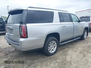 2019 GMC Yukon XL SLT z VIN 1GKS1GKC0KR242408, wystawiony jako IAAI lot #42144783 z przebiegiem Nie podano mil oraz . Historia ofert i sprzedaży dostępna na DreamBid. Obrazek 4.
