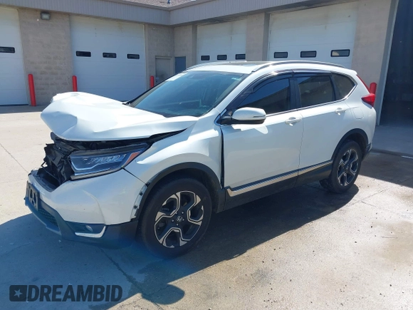 2018 Honda CR-V Touring with VIN 2HKRW2H92JH662753, listed as a IAAI auction lot 39538586 with 83,202 mi miles. Bid and sale history available at carsss.com. Image 18.