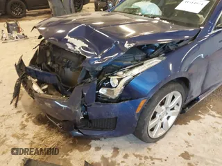 2014 Cadillac ATS Standard AWD with VIN 1G6AG5RX4E0170756, listed as a IAAI auction lot 41514974 with 126,524 mi miles and . Bid and sale history available at carsss.com. Image 6.