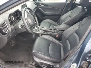 2015 Mazda 3 i Grand Touring with VIN JM1BM1M77F1242152, listed as a Copart auction lot 58266045 with 81,503 mi miles and Salvage title. Bid and sale history available at DreamBid. Image 7.