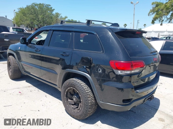 2017 Jeep Grand Cherokee Trailhawk with VIN 1C4RJFLG3HC836072, listed as a IAAI auction lot 42073775 with 139,374 mi miles and . Bid and sale history available at DreamBid. Image 3.