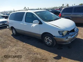 2002 Toyota Sienna LE with VIN 4T3ZF13C62U444564, listed as a IAAI auction lot 41515466 with 284,745 mi miles. Bid and sale history available at carsss.com. Image 1.